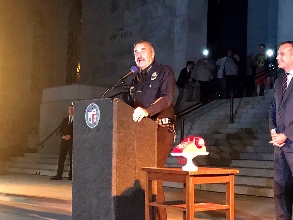 LAPDChiefBeck's tweet photo. Everyday I think to myself 'if only I could flip on the bat signal'-tonight I got to-We'll never forget the #BrightKnight. Rest easy #Batman https://t.co/qNN7WX3WCn
