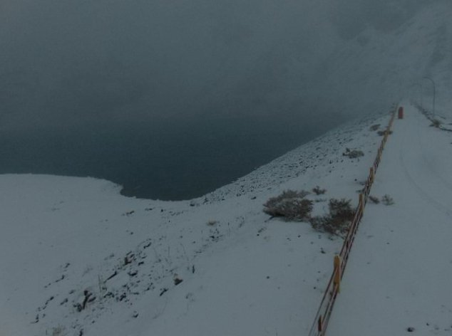 aguas_andinas's tweet photo. #AAInforma: Mientras nieva en el embalse El Yeso, seguimos monitoreando el frente de lluvias. Nuestro servicio en la RM se encuentra normal. https://t.co/55RoEsqOV0
