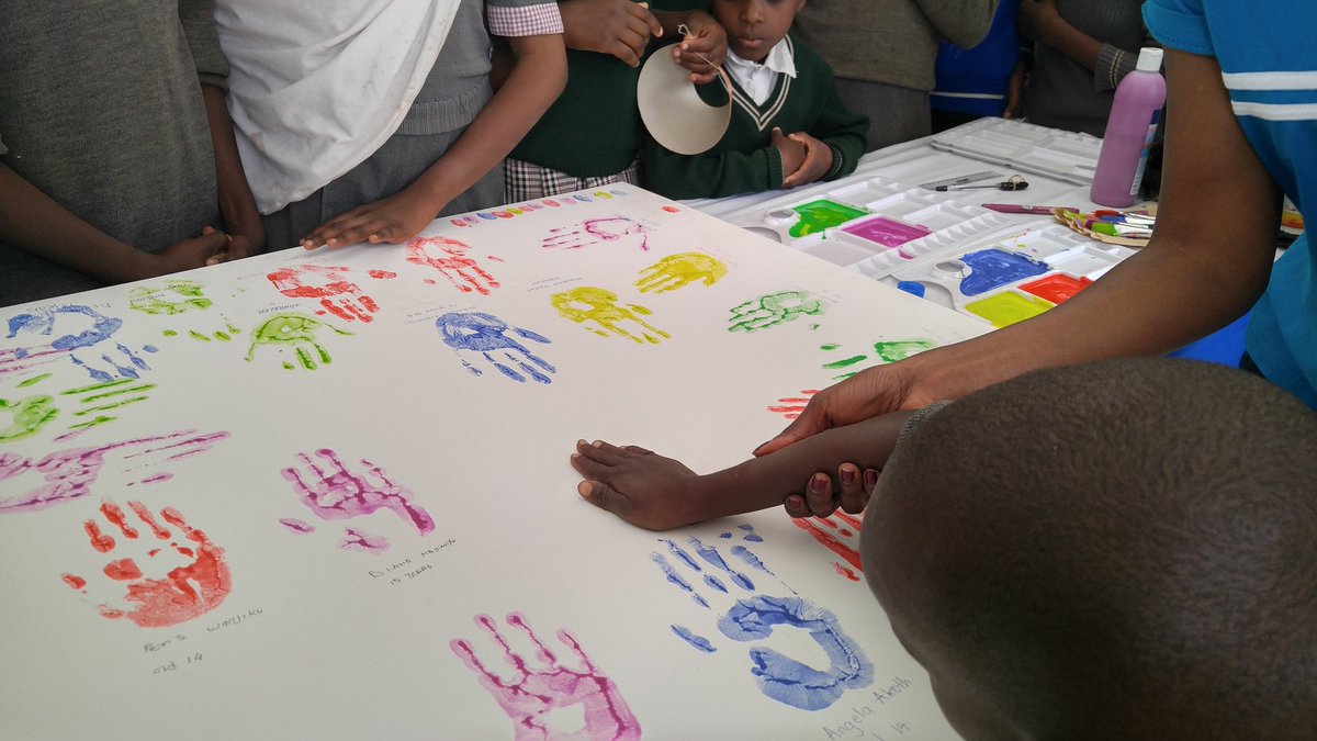 PlanKenya's tweet photo. #DAC2017 is enjoyable. Children leaving their prints after learning about #SDGs4Children @PlanRESA @PlanGlobal @MTotoNews @SaveChildren_KE https://t.co/UGZ6lT0oEX