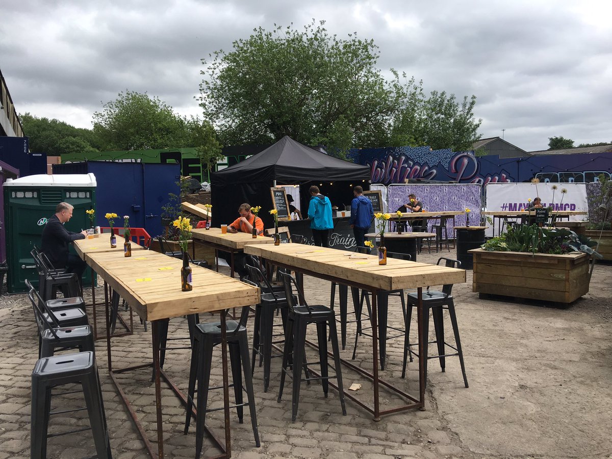 MensShedMcr's tweet photo. We're at @MayfieldMCR with @GRUBMCR again: like most people you can't stay away!! Set up #upcycled #fireextinguisher seats &amp;mods to others https://t.co/CMcD5y0O2F