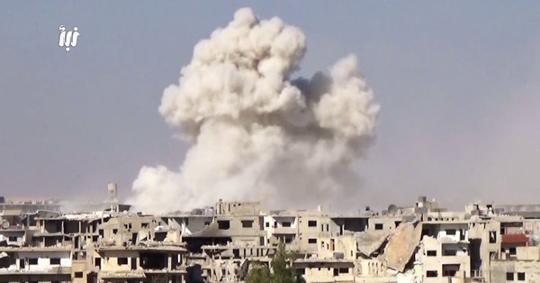 Syrian artillery pounds islamist in Daraa city.