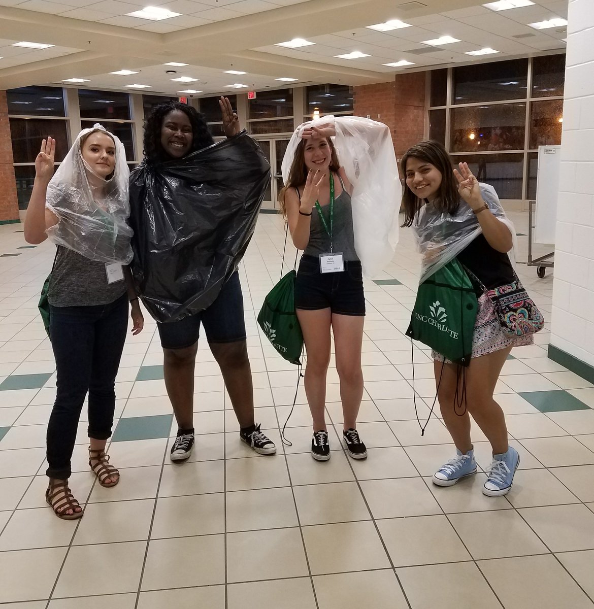 Dylan17OC25's tweet photo. Who do we do it for?? #2FiveCrew knows we #DoItForDale even when they wear trash bags to stay dry. Y'all are awesome!! #UNCC21 #3forDale https://t.co/DqNiwbGoLF