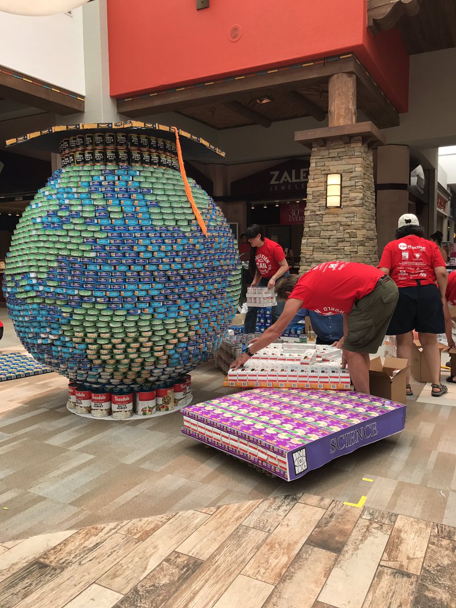 StudioSWArch's tweet photo. Can you guess what we're working on building now?! It's almost complete! 🎓🌎📚 #CanSantaFe2017 #CANdemonium #CanstructionSantaFe https://t.co/WCqi0O3AA2