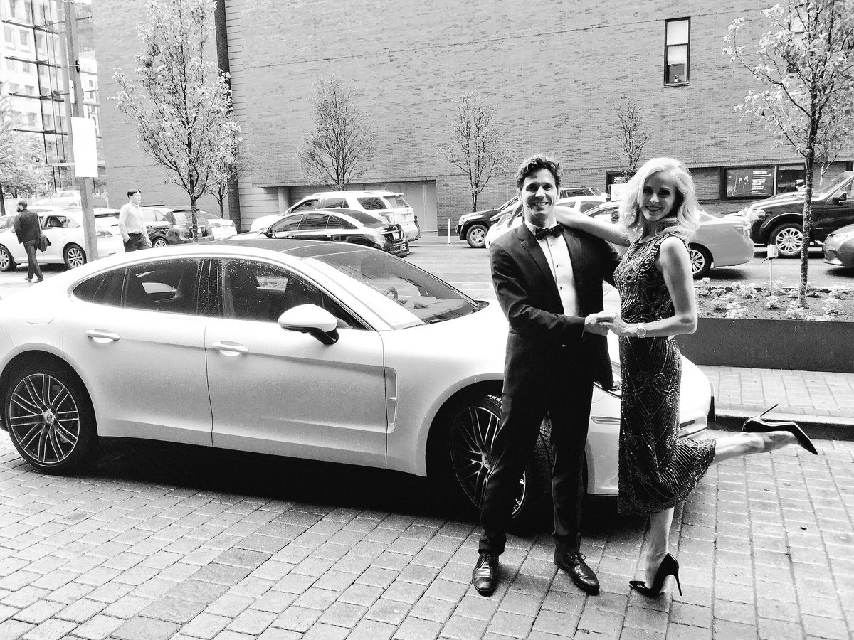 heatherogden's tweet photo. About last night.. Feeling fancy w @guillaume__cote 4 opening night #SwanLakeNBC Striking a pose w this #whiteswan @PorscheCanada #panamara https://t.co/ifCN71gVT5