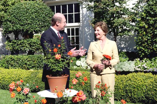 GWBLibrary's tweet photo. #NationalRoseMonth #FLOTUS_Friday Mrs Laura Bush, ’06 unveiling “Laura Bush rose” -part of First Ladies Rose Series: https://t.co/Iobi0PljAS https://t.co/7qc4wuwU39