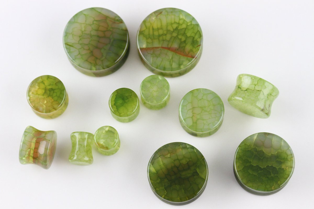 TwoFeathered's tweet photo. JUST LISTED. We have made 1 pair of our green dragon glass plugs. 12mm sold this morning. Available from 6mm - 25mm. https://t.co/ws3l5T4Yz6 https://t.co/wF0QUy5HBb