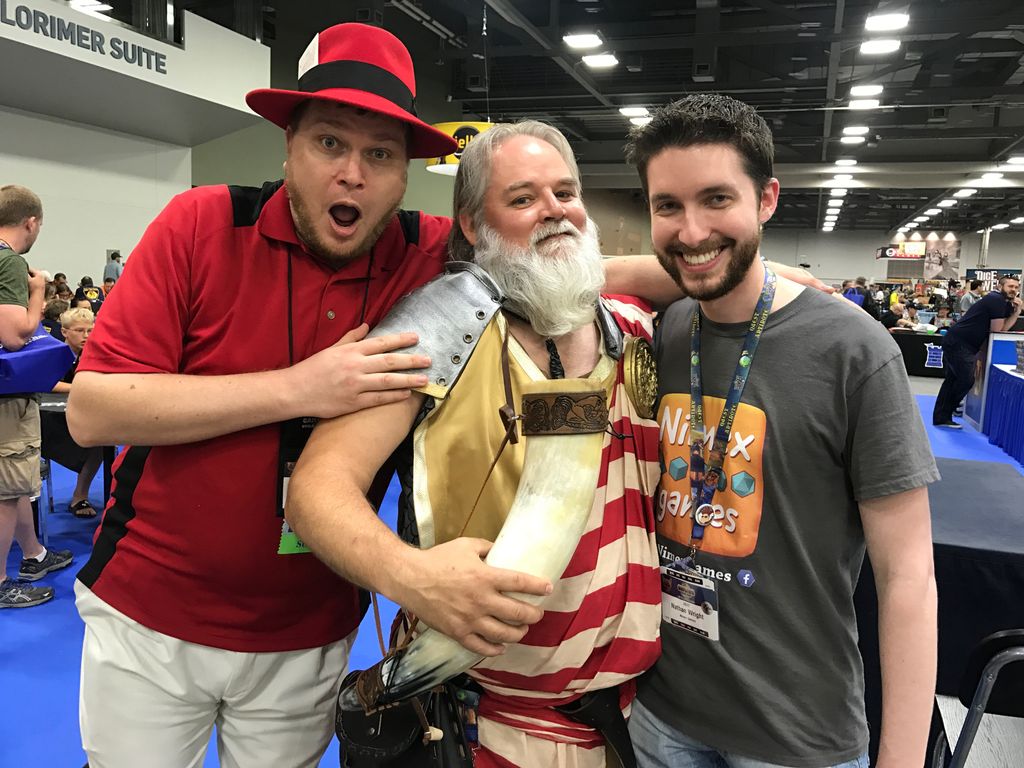 NimexGames's tweet photo. @kimpek and Tom Vasel @thedicetower acting crazy at #Origins2017... I wish someone told me that's what we were doing for the picture XD https://t.co/qgLKiBQSCv