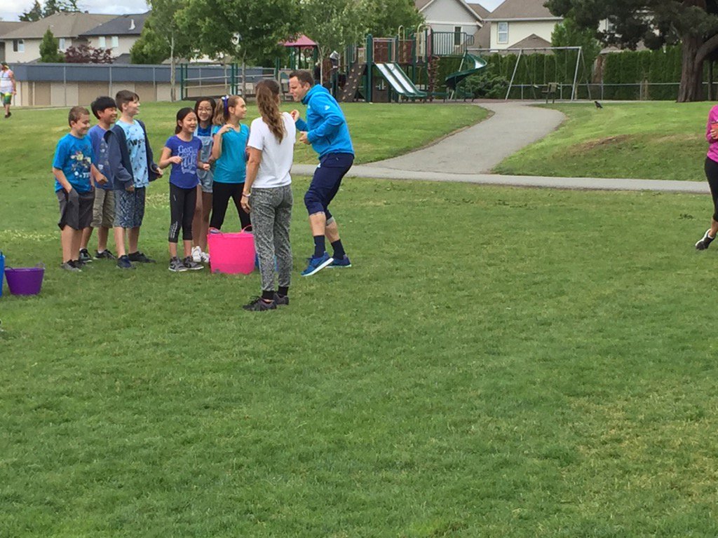 Mr. Woelders enthusiastically leads a team cheer for the Blue Team! Rcgisawesome