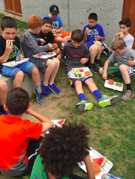 Recipe for a perfect lunch: Hotdogs, hamburgers, pasta salad and watermelon enjoyed in the sunlit amphitheater. Thanks to the kitchen staff.
