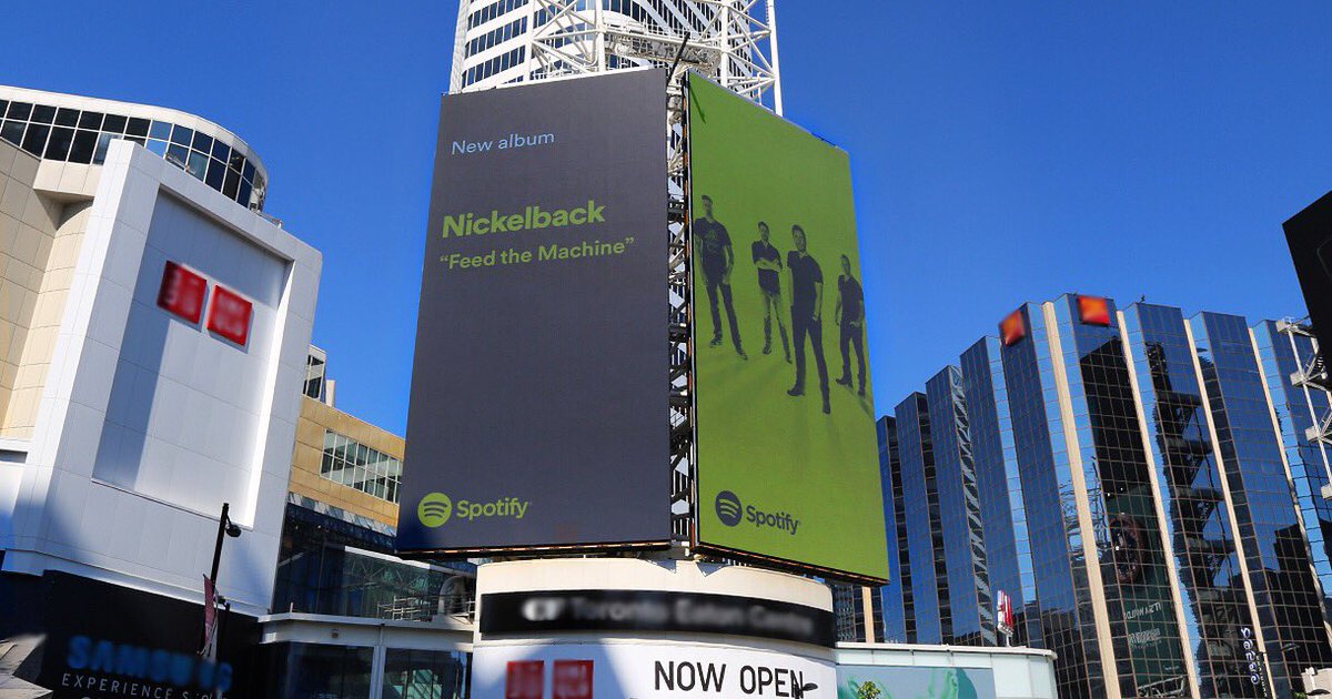 Nickelback's tweet photo. Would you look at those guys standing tall in Toronto? Thanks @spotifycanada &amp; @Spotify 👊 #FeedTheMachine // https://t.co/eiekv27bC3 https://t.co/wAqFZohpYC
