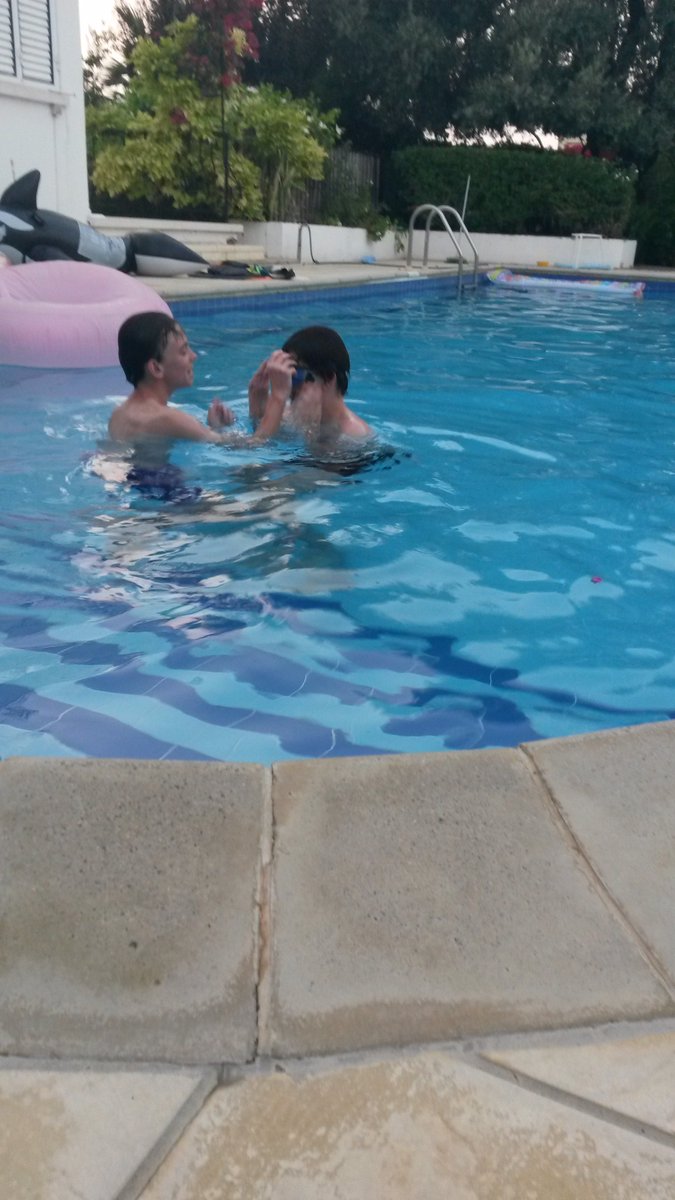 AnnieBannister's tweet photo. #RareChromoWeek #SuperSiblingsDay Felix helping #Chromokid Tom put his swimming goggles on. @Unique_charity https://t.co/1jCNk9DtYH
