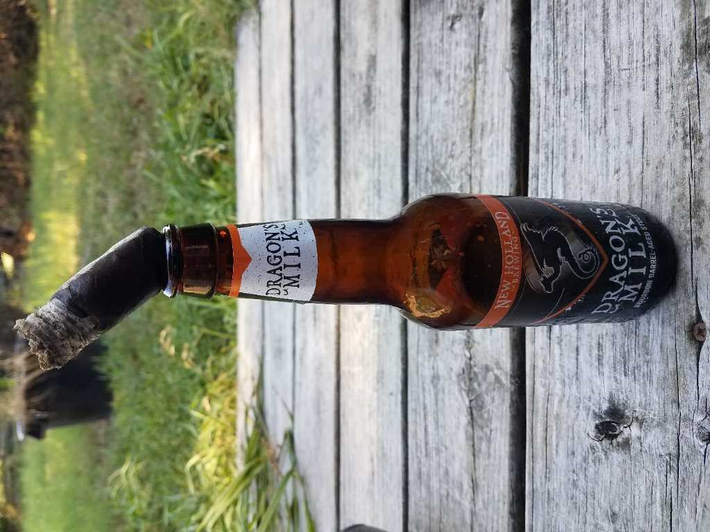 JimCFain's tweet photo. Partagas Black Label and a bit of Dragons Milk to wet the whistle. Happy Friday ya'll. https://t.co/unE6VACOsT