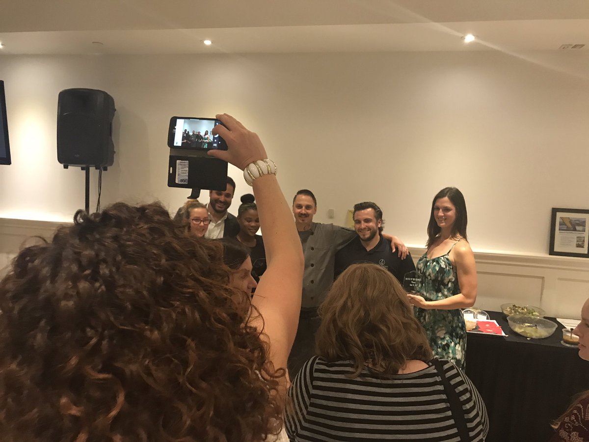 GailNow's tweet photo. There's @NettieBaynz @twepi front & centre getting photo @UnitedWayWE #botg17 @Peleewinery Winner is @SprucewoodWine https://t.co/rzjxyy86zR