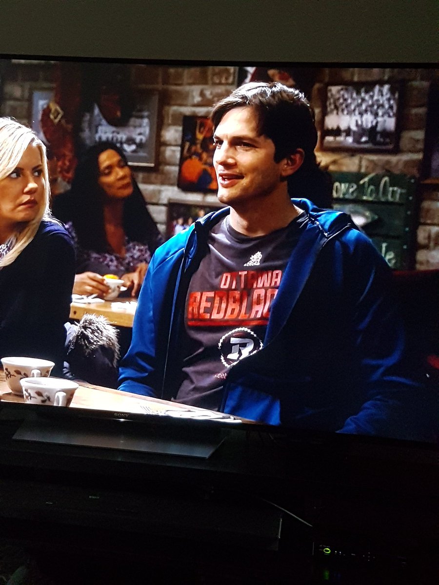 RDNeville's tweet photo. Ashton Kutcher rocking an @OttawaRedBlacks shirt in Season 3 of @theranchnetflix Can this show get any better? https://t.co/oNFm0tK2S7