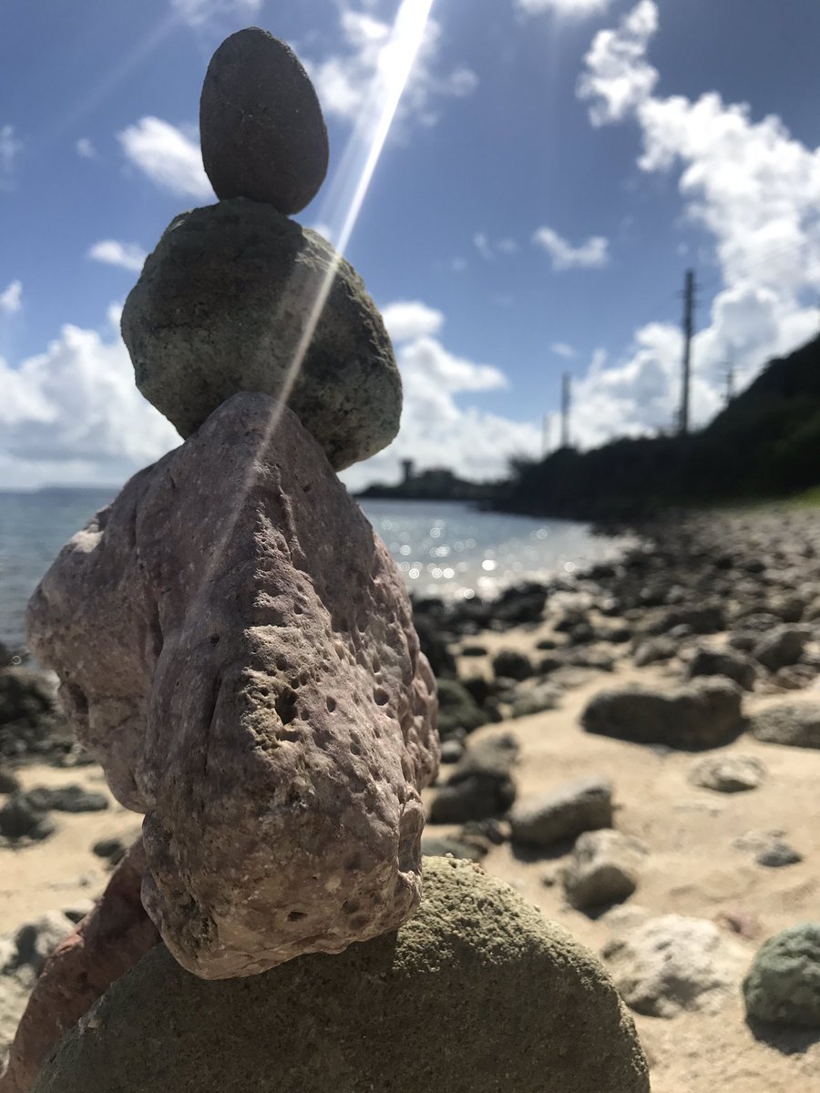 Monstabarry8's tweet photo. Found these colorful rocks so I stacked them up and created something spectacular #balancerocks https://t.co/oCwGbCjjYA
