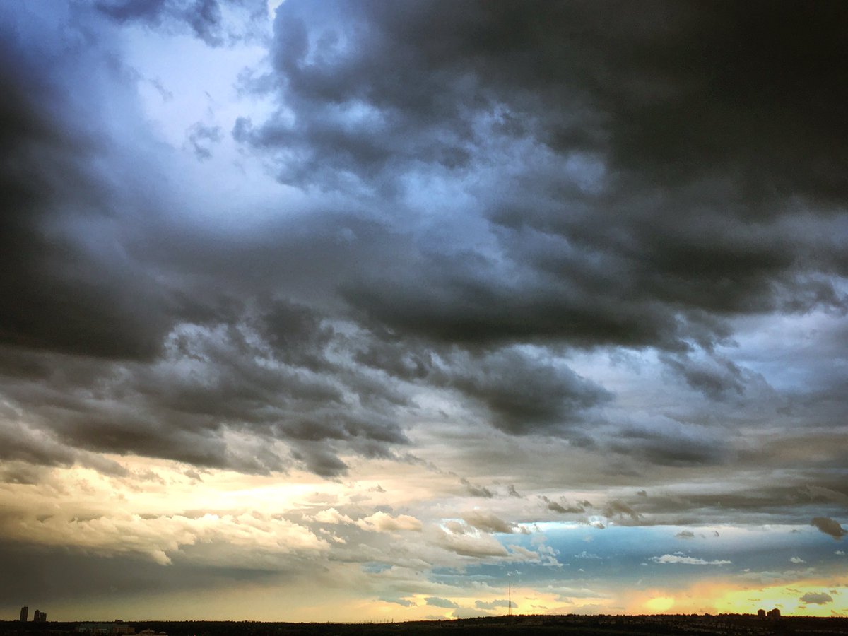 Beautifully dramatic skies over #yyc tonight. #clouds #calgaryskyline