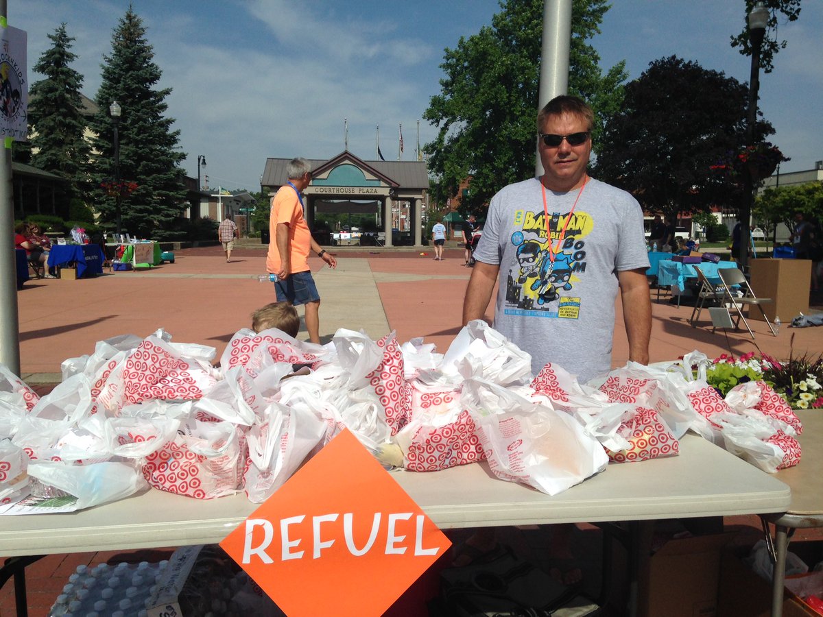 Passing out Target bags of goodies at the Hancock 4kids 5K walk. <a href="/Target/">Target</a> <a href="/salamlazkani/">salamlazkani</a>  <a href="/thenewcrc/">Carla Clark</a>