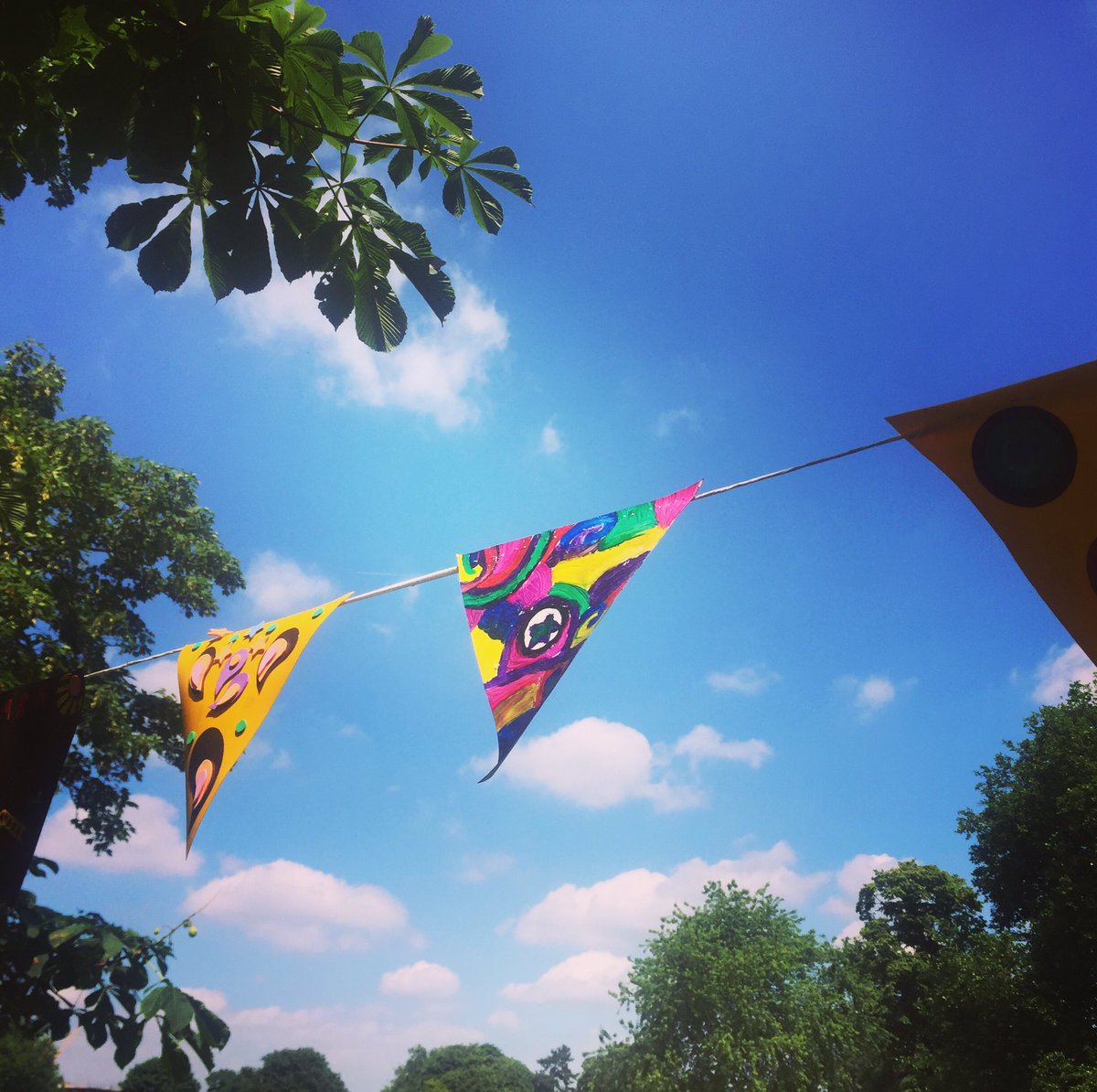 Croydonist's tweet photo. @CRSummerofLove festival is under way - flags flying, bands playing, people smiling. Here's to a sunny #Croydon afternoon folks. https://t.co/cbcivFNH5C