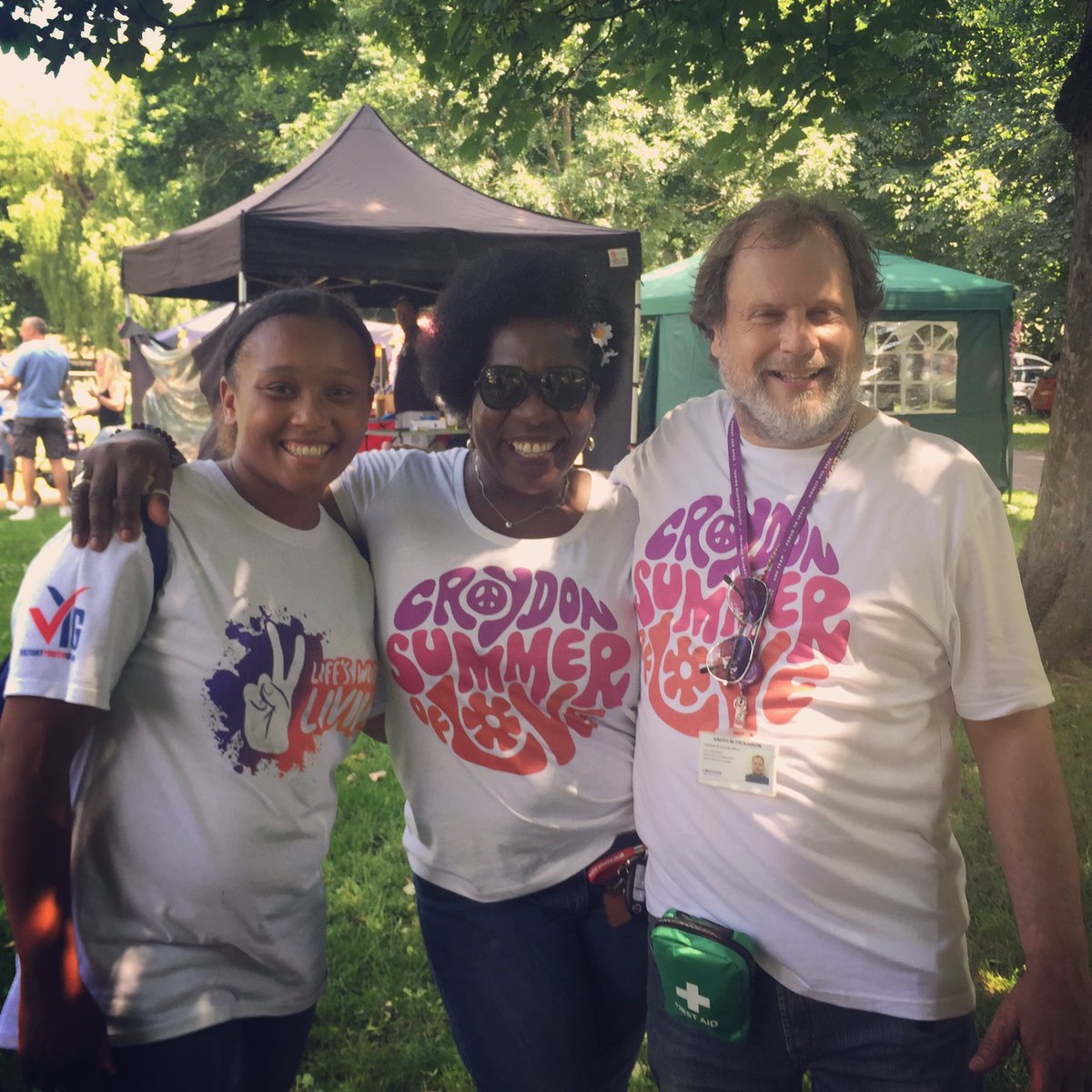 <a href="/CRSummerofLove/">CroydonSummerofLove</a> festival is under way - flags flying, bands playing, people smiling. Here's to a sunny #Croydon afternoon folks.