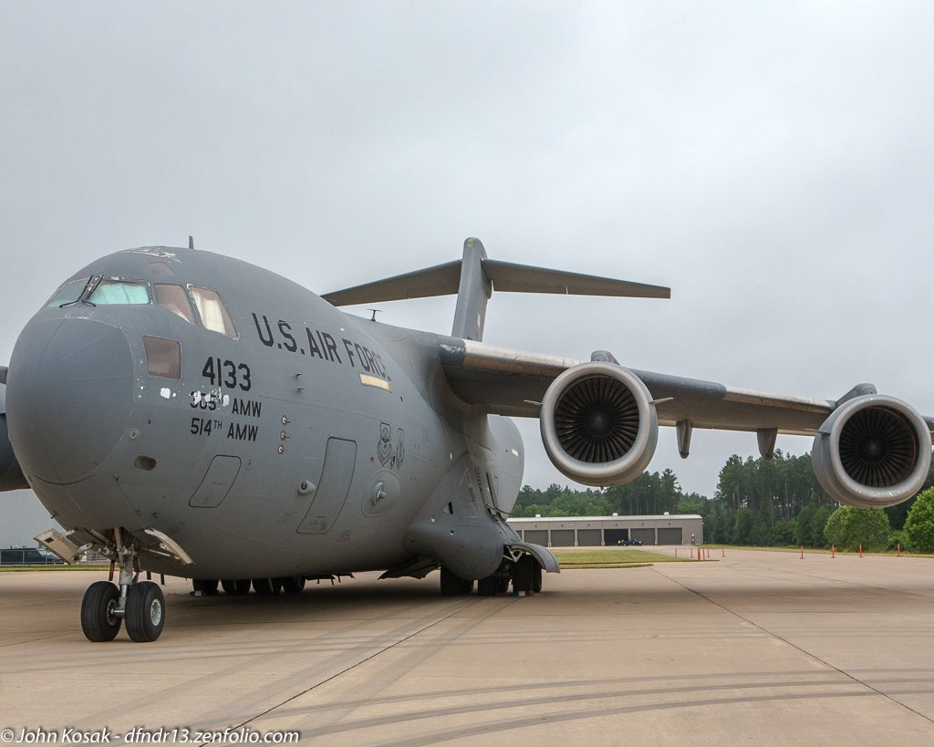 Defender13's tweet photo. A @usairforce C-17A Globemaster III from McChord sits behind the space hangar at @airandspace on @Dulles_Airport for #InFlight17 https://t.co/cA2IfKPxQf