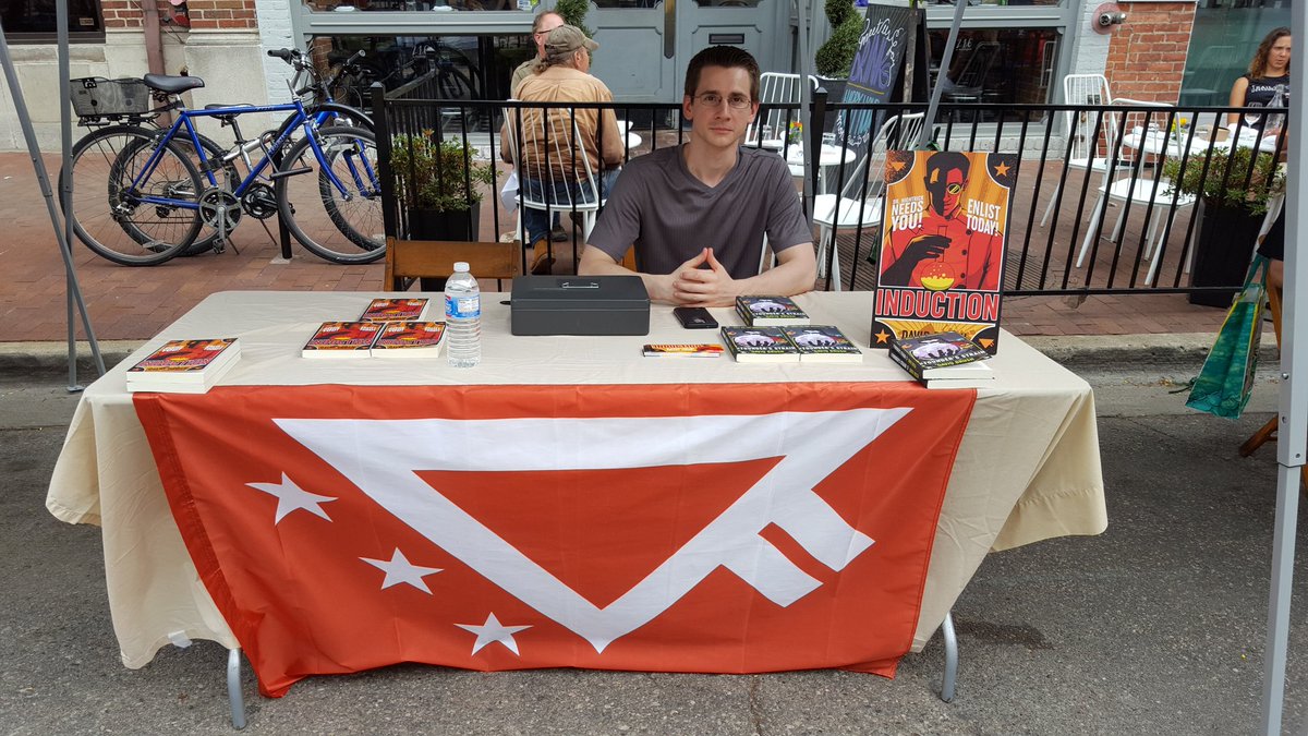 AABookFestival's tweet photo. David Brush has two titles - Induction, as well as his latest, The Founder's Strain. Both are for sale at the Street Fair. @InductionIsLove https://t.co/HLp9tMnmZN