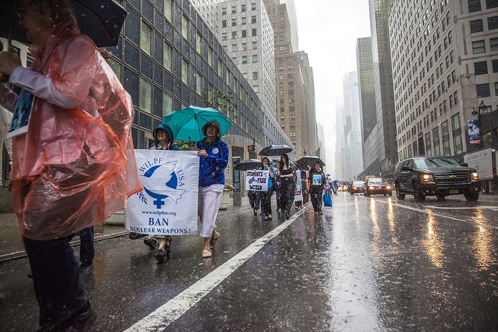 RunPhotoDog's tweet photo. #womenbanthebomb, #nuclearban, Great march today in the rain! https://t.co/TS0NcMbtMe