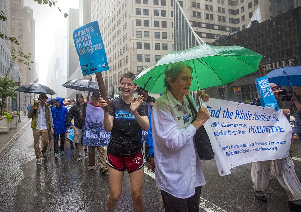 RunPhotoDog's tweet photo. #womenbanthebomb, #nuclearban, Great march today in the rain! https://t.co/TS0NcMbtMe