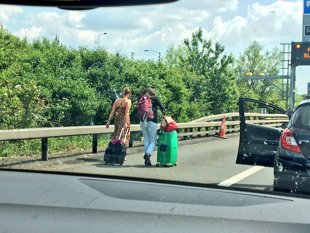 Passengers now walking to #Heathrow... #M25