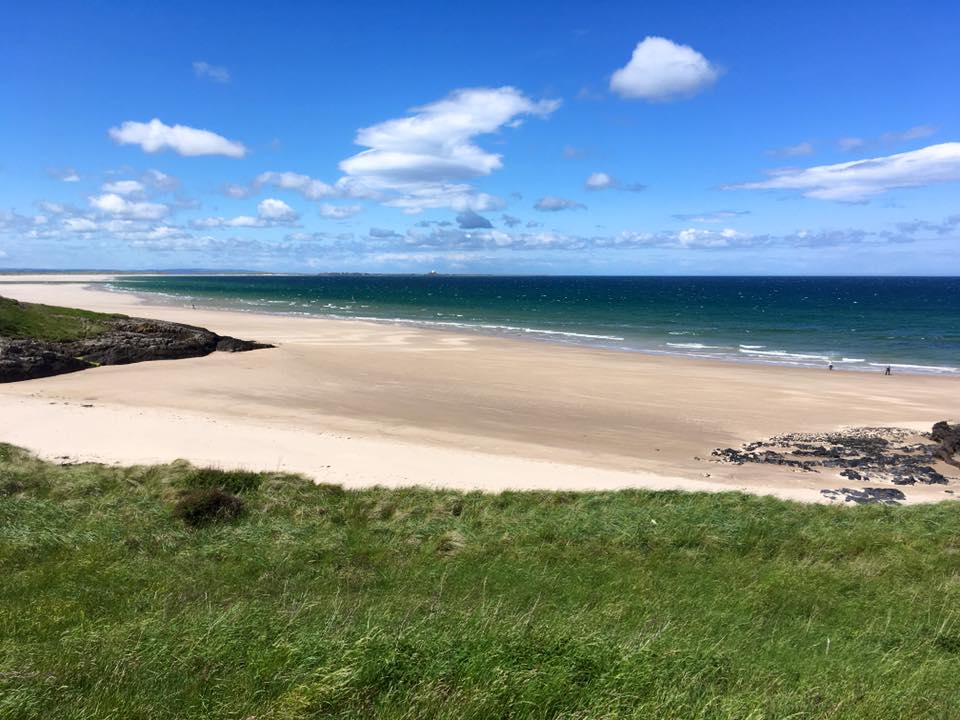 VIEW OF #NORTHUMBERLAND: Golden sand at Picnic Bay, #Bamburgh, looking towards #Budle and Ross Back Sands by Iain Robson.