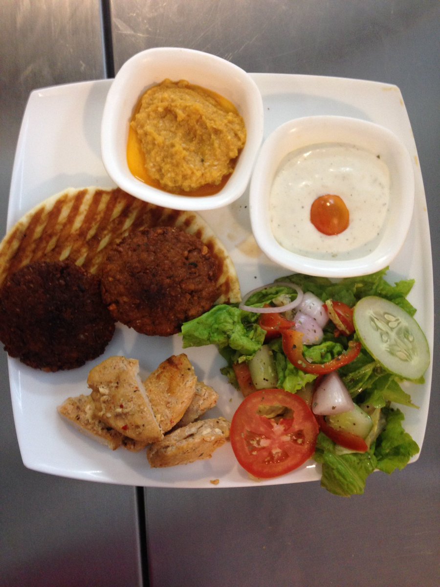 The Turkish Platter #HummusWithPitaBread #Falafel patty #TahiniSauce #GrilledChickenStrips with fresh#salad #chefspecial #TheCantinaMoments