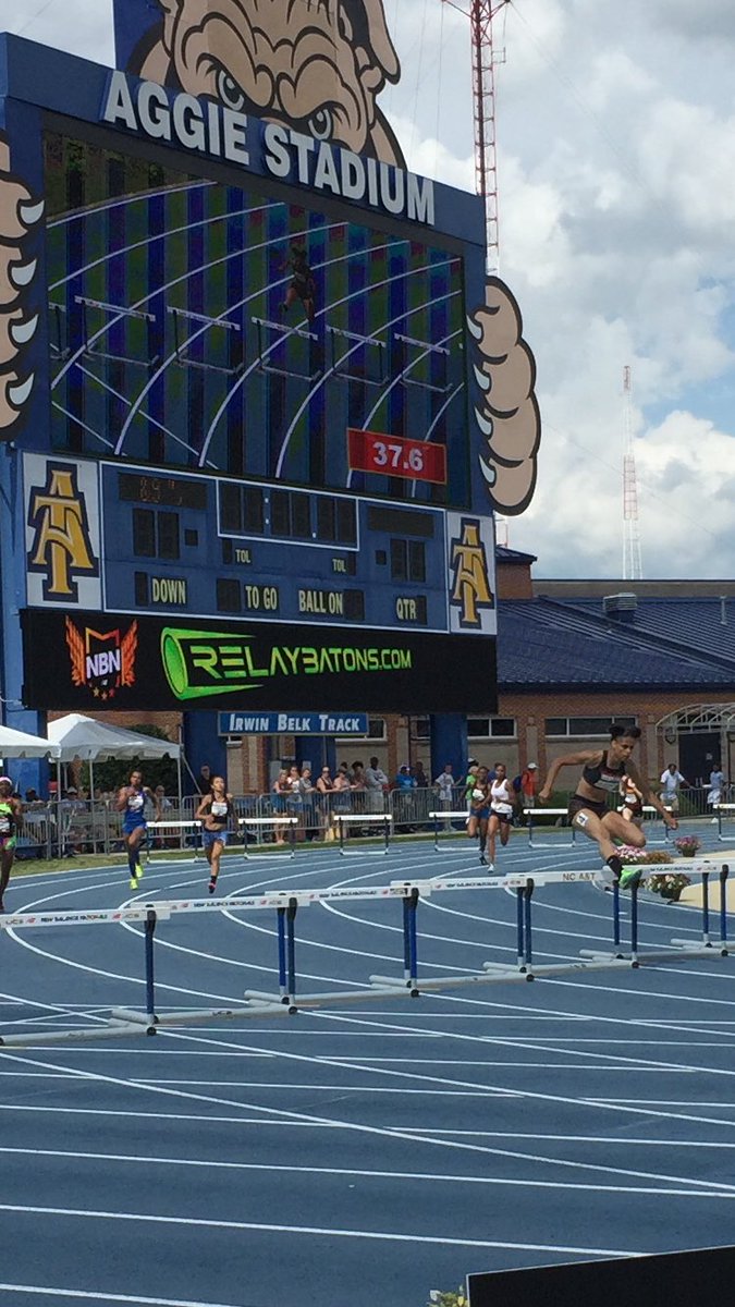 RelayBatons's tweet photo. So...no @GoSydGo is not holding 1 of our batons BUT our #RelayBatons logo IS in the background. So there's that. @TweetingTrack #NBNationals https://t.co/PDOBO9T5Nl