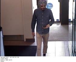 WRPSToday's tweet photo. Looking to speak to this person in connection to a #robbery that occurred today at Waterloo Bank of Montreal. Call police or @WaterlooCrime https://t.co/qm9chipFwP