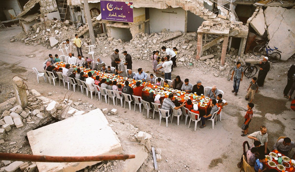 A Ramadan iftar in war torn Douma, #Syria , not too far from Damascus