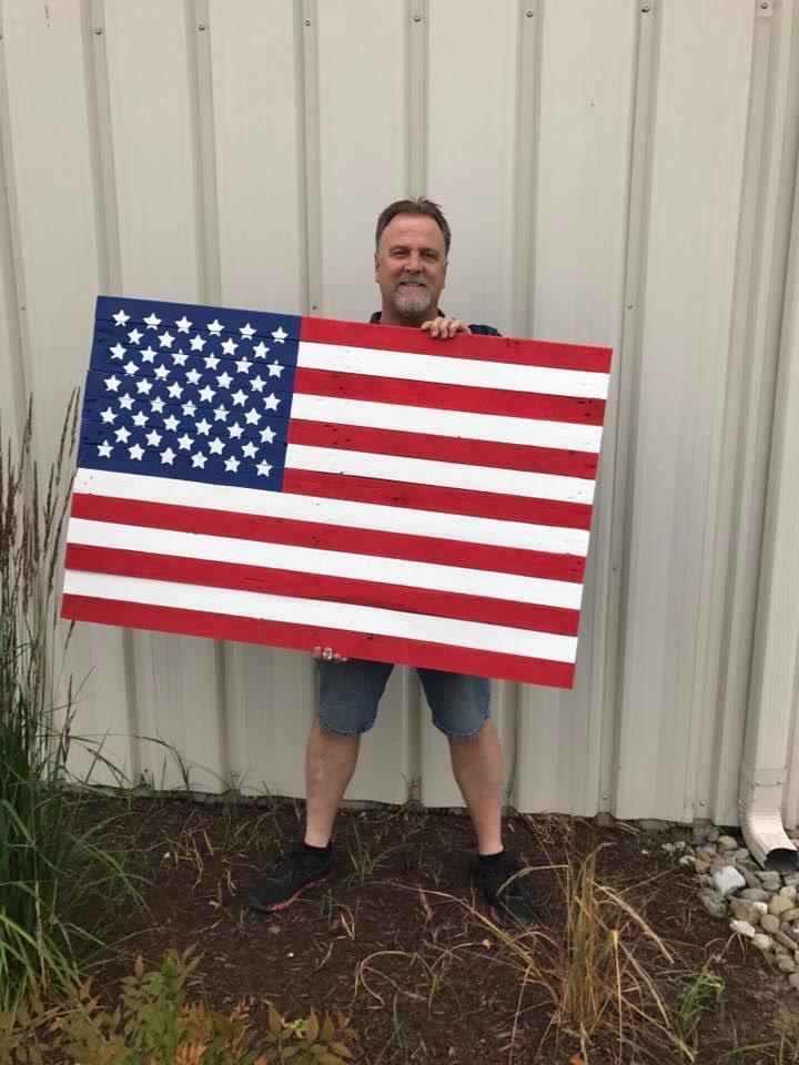 FirstStateTrade's tweet image. Dave hard at work making these awesome American flags from reclaimed wood #americanflag #america #american #woodworking #reclaimedwood