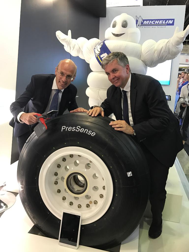 Michelin's tweet photo. At @salondubourget, Michelin &amp; @Safran unveiled #PresSense, the 1st connected tire for #aircraft! https://t.co/eipVrRycDT https://t.co/iBss5ZsLE7