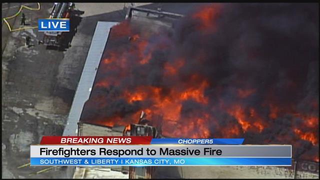KCTV5's tweet photo. PHOTOS: Fire crews working a significant fire on Southwest Boulevard in KCMO. #BREAKING https://t.co/nBjBjE7jHd