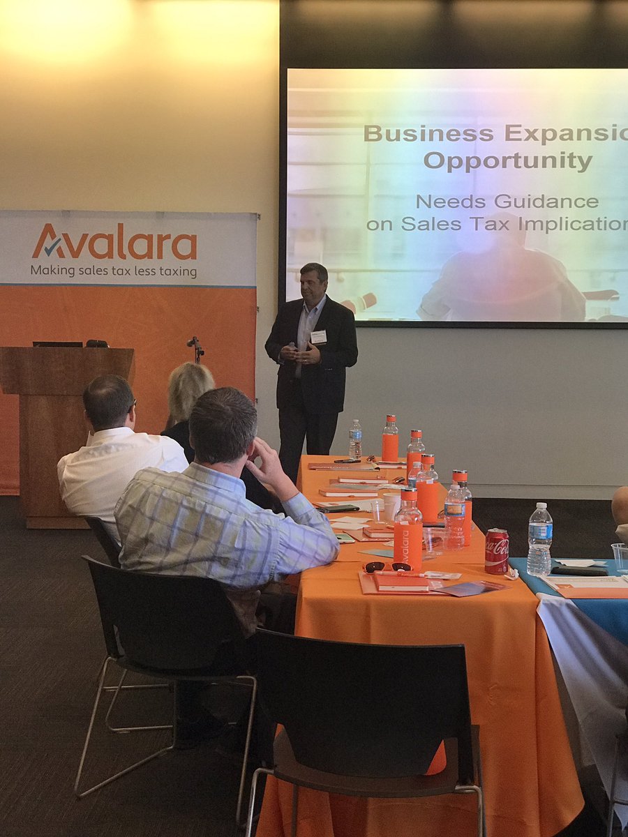 Andy Johnson of @PeisnerJohnson helping <a href="/avalara/">Avalara</a> customers in SLC learn how to deal with tax compliance AND love their jobs! #PowerOfOrange