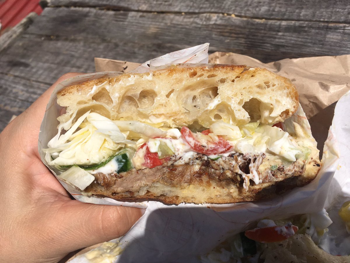 joshspero's tweet photo. How have I just come to @thedustyknuckle after seven years in Dalston‽ Amazing spiced lamb sandwich today https://t.co/0KMiWk55U9