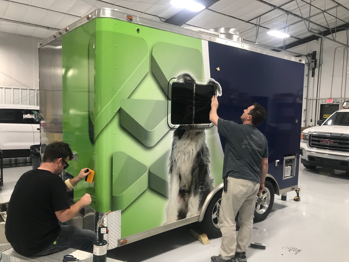 Graphics being applied to our new trailer! Shout out to DMC Graphics for doing an amazing job for us!