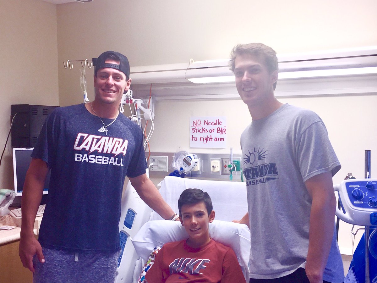 Diamond6cc's tweet photo. Caleb's day was made thanks to a visit from these guys! Ready for another season! @CatawbaBaseball @lsetzer8 @clay_young_2 @GoTeamIMPACT https://t.co/SMdIqBmuIR