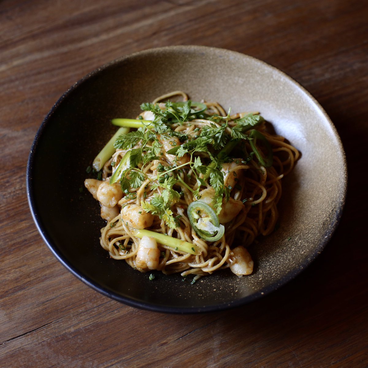 Spicy noodles with prawns and garlic shoots. #sakerestaurant