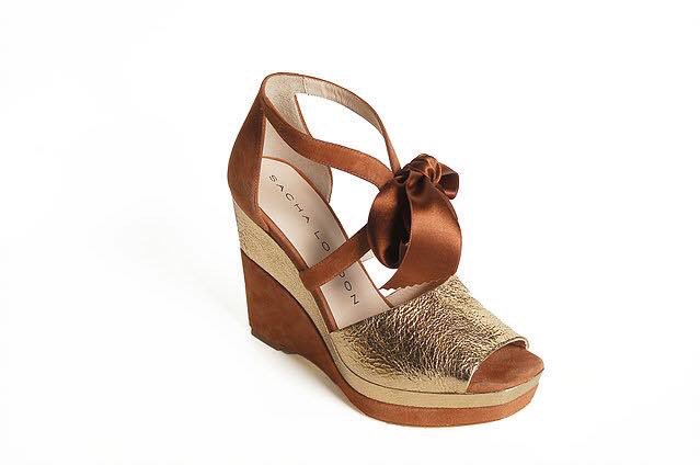 MuseoCalzadoESP's tweet photo. Las cuñas lace up de @SACHALONDON son otro de los pares de tendencia que nuestra Mejor Calzada 2016 tiene en su armario este verano https://t.co/YgGeuKhyyI