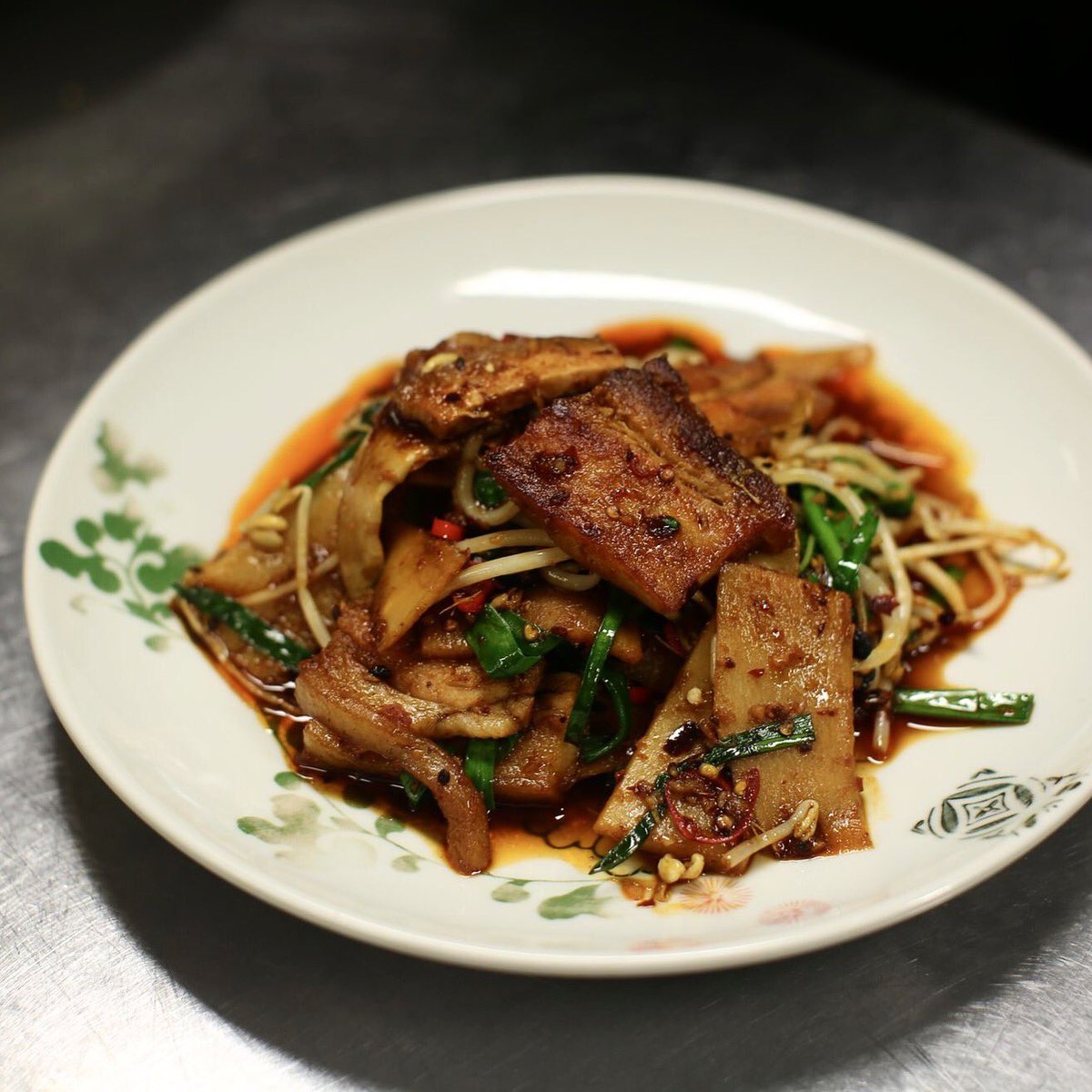 Stir fried twice cooked pork with leeks and Sichuan black bean at #spicetemple #melbourne.