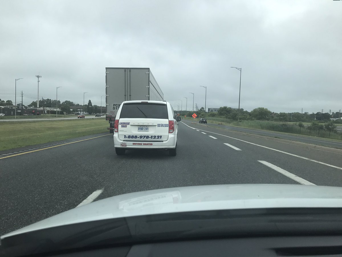 GailNow's tweet photo. #ZipperMerging working well until a taxi straddled 2 lanes causing traffic to back up! Otherwise a success @CityWindsorON Signage is great! https://t.co/outku6zeX0