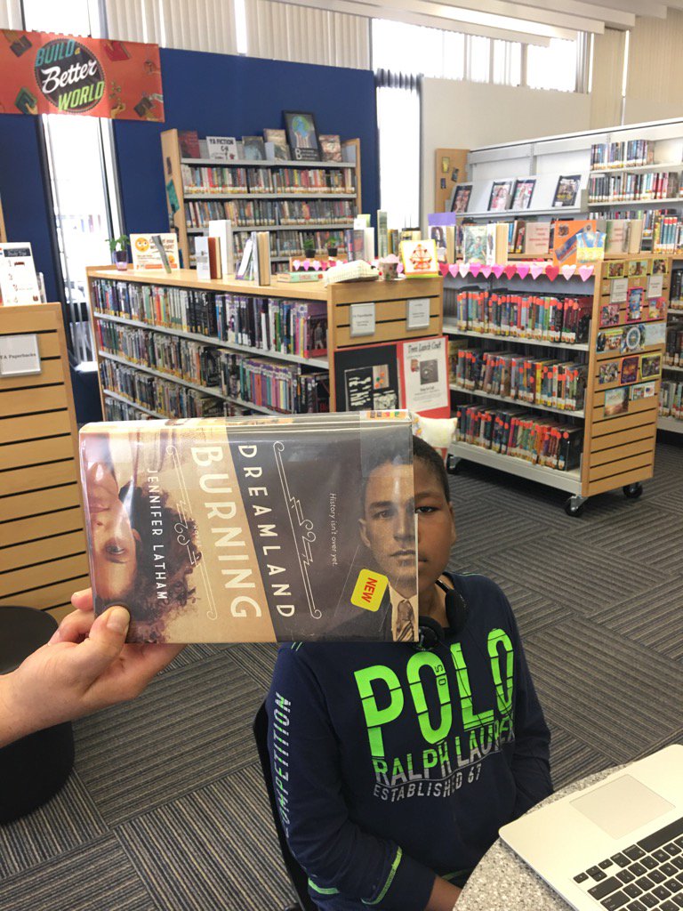 RoseannPodias's tweet photo. BOOK FACE FRIDAY.                     Dreamland Burning by Jennifer Latham. @UPL_Library https://t.co/TXDx5mxejG