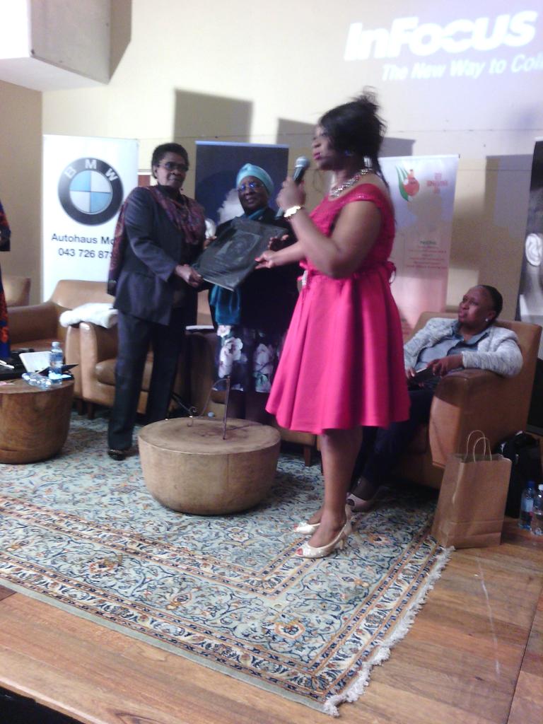 asanda653's tweet photo. Adv Mzimba, Mrs Mzimba Senior &amp; RAF rep presenting a tab w/ Mrs NBiko face as a significance of the 40th anniversary https://t.co/fwZR97XcRv