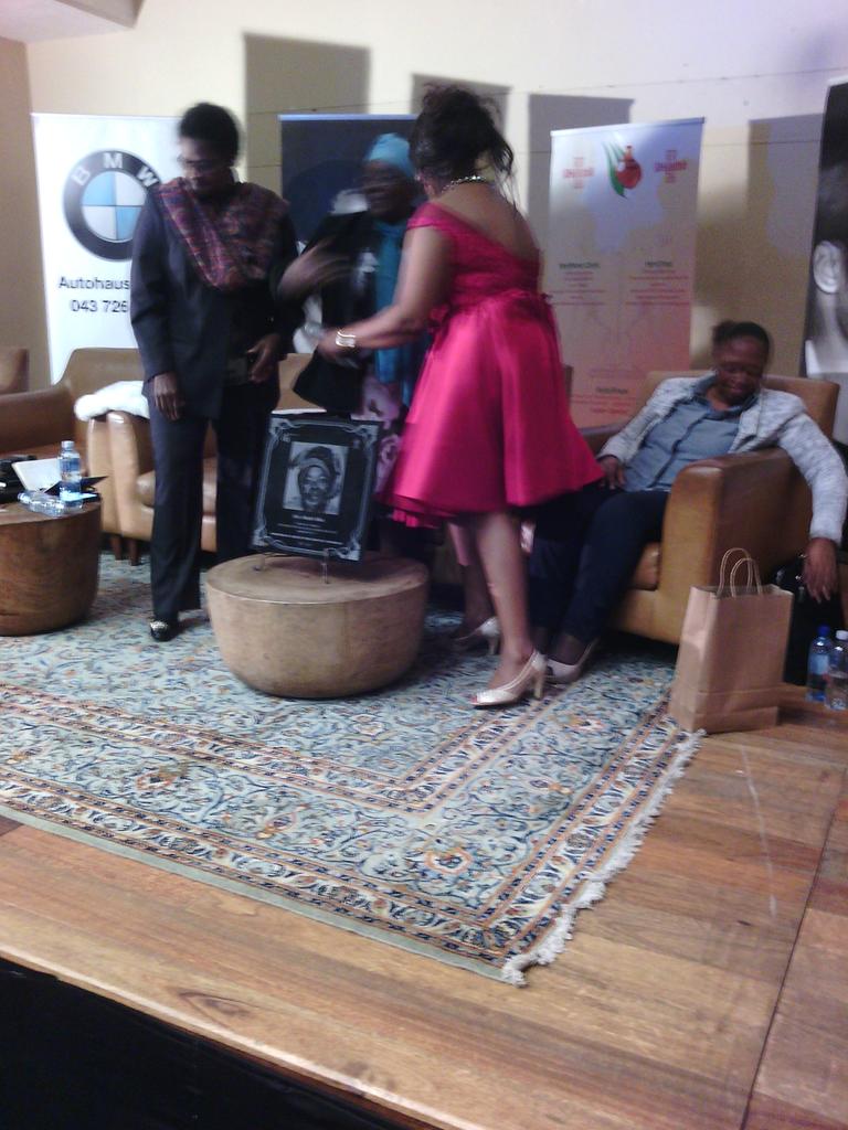 asanda653's tweet photo. Adv Mzimba, Mrs Mzimba Senior &amp; RAF rep presenting a tab w/ Mrs NBiko face as a significance of the 40th anniversary https://t.co/fwZR97XcRv