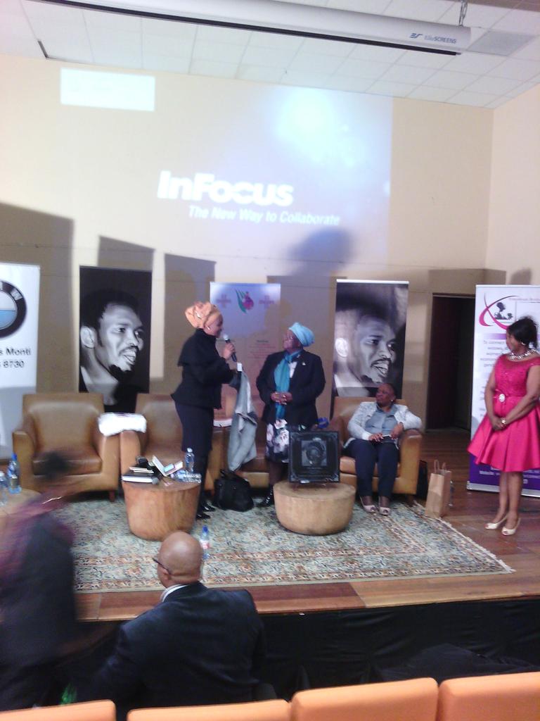 asanda653's tweet photo. Adv Mzimba, Mrs Mzimba Senior &amp; RAF rep presenting a tab w/ Mrs NBiko face as a significance of the 40th anniversary https://t.co/fwZR97XcRv