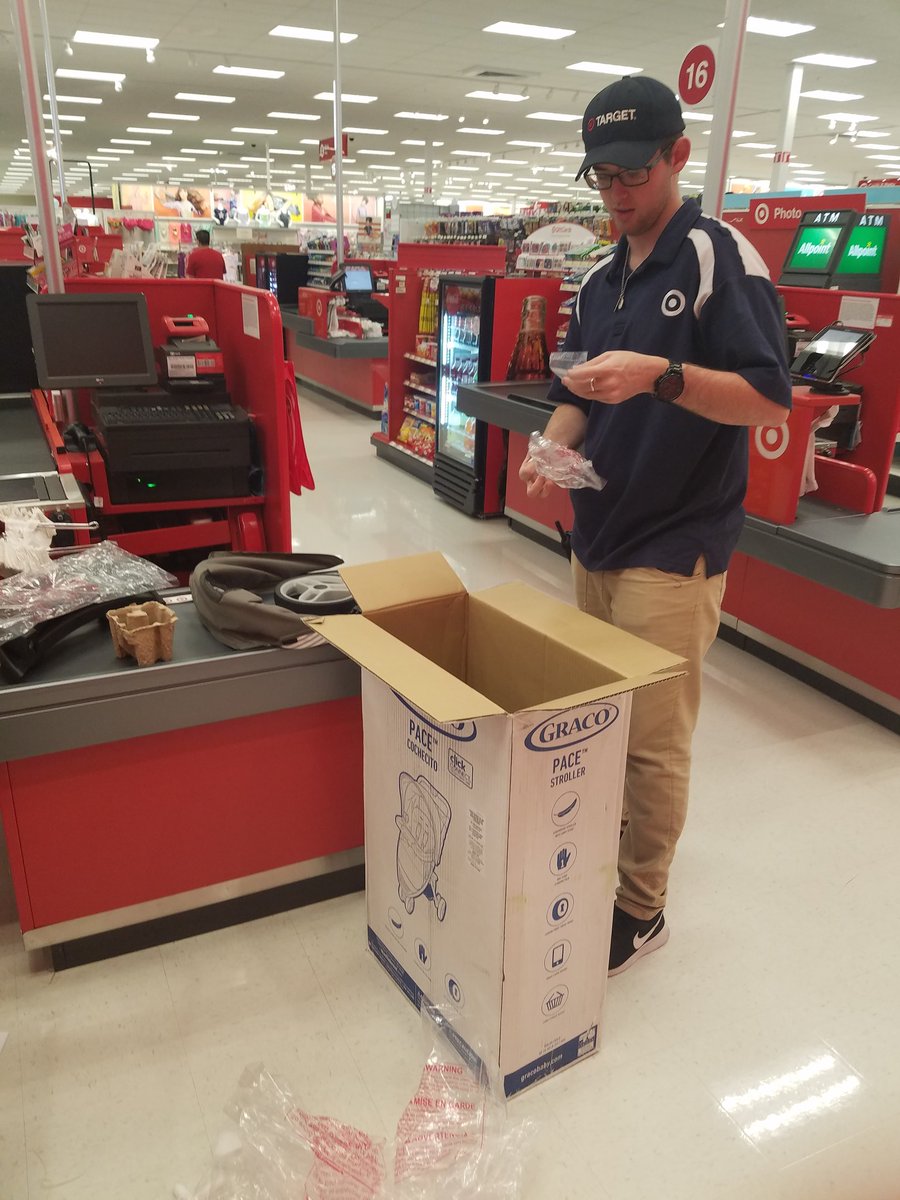 A team member going #AboveAndBeyond for our guests by assisting a new mom with her stroller assembly! #DoWhatYouLove #LoveWhatYouDo <a href="/Target/">Target</a>