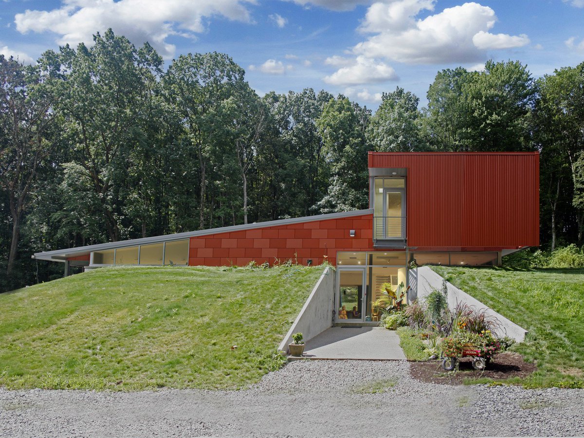 fisherarch's tweet photo. The #DriDesign #metalpanels and #Atas Corra-Lock #siding of the #earthshelter #Ewinghouse front #facade are wearing well! #greenbuilding https://t.co/yCdMrECXWx